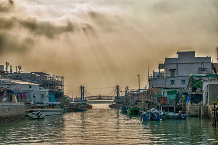 Hong Kong, China - November 30, 2015: Houses on stilts above the tidal flats of Lantau Island are homes to the Tanka people in Tai O, Hong Kong. These unusual structures are interconnected, forming a tightly knit fishing community that literally lives on のeditorial素材