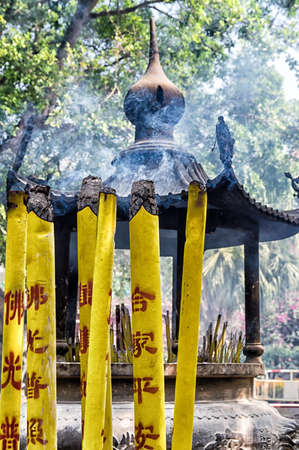 incense sticks burning at a temple in Chinaの写真素材
