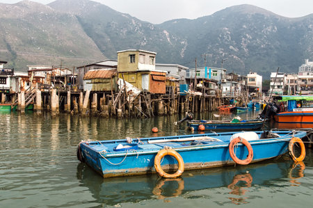 Hong Kong, China - November 30, 2015: Houses on stilts above the tidal flats of Lantau Island are homes to the Tanka people in Tai O, Hong Kong. These unusual structures are interconnected, forming a tightly knit fishing community that literally lives on のeditorial素材