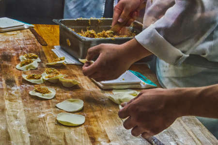 Chinese Chefs Preparing vegetable dim sums chinese dumplingsの写真素材