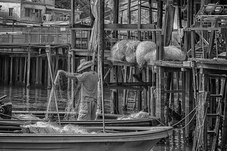 Chinese Fisherman checking his netsのeditorial素材