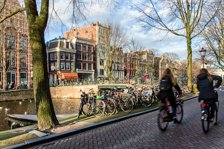 Bikes on the bridge in Amsterdam Netherlandsのeditorial素材