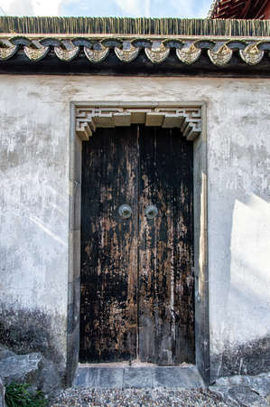 Unusual doorway in ancient Yu Yuan Garden in Shanghai, Chinaの写真素材