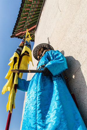 Seoul, South Korea - February 6, 2016: Royal Guards at the Gyeongbok Palace also known as Gyeongbokgung Palace. This royal palace is located in northern Seoul. First constructed in 1394 and reconstructed in 1867, it was the main and largest palace of the のeditorial素材