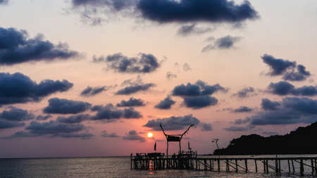 Landscape of Wooded bridge pier between sunset Koh Kood, Thailandの写真素材