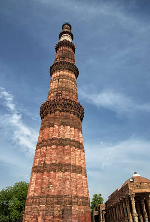 At 72.5 meters (237.8 ft), the Qutab Minar is the tallest brick minaret in the world. The tower is in the Qutb complex at Mehrauli in South Delhi, India. It is listed as a UNESCO World Heritage Site.の写真素材