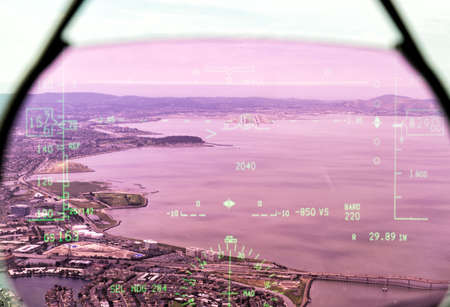 View through the HUD of an airplane during an appoach at San Francisco,USA