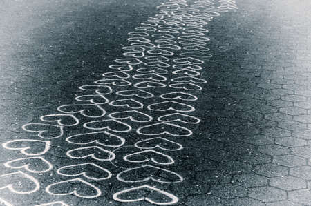 heart drawing on the pavement.seamless pattern with heartsの写真素材