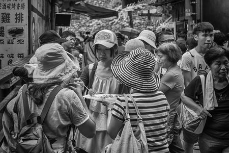 Pingxi, Taiwan. July 24, 2016. People eating on the streets of Pingxi, Taiwanのeditorial素材
