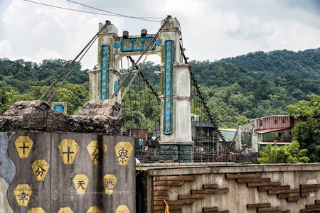 SHIFEN, TAIWAN - JUL 24, 2016: Jingan Suspension Bridge linked between Shifen and Nanshan Village at Shifen, Taiwan.のeditorial素材