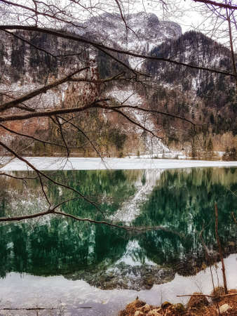Refections on the water of Vorder Langbathsee in Austria, Salzkammergut