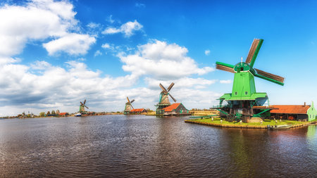 Authentic Zaandam mills on the water channel in Zaanstad, The Netherlands
