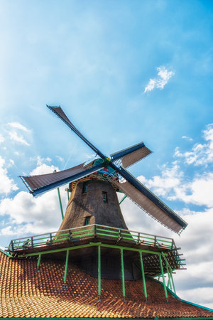 Paint Mill De Kat in Zaanse Schans,Traditional Dutch old wooden windmill in Zaanse Schans - museum village in Zaandam. The Netherlands.のeditorial素材