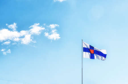 Flag of Finland against a blue skyの写真素材