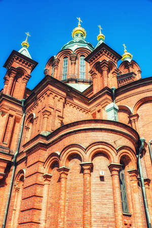 detail of an Orthodox church in Helsinki over a blue skyの写真素材