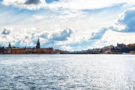 Panoramic shot of Stockholm under cloudy sky from Vasabron Bridgeの写真素材
