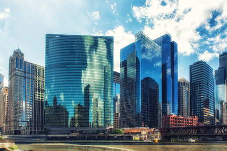 Chicago, Illinois - June 18, 2017: 333 West Wacker Drive is a highrise office building in Chicago, Illinois. On the Chicago River side, the building features a curved green glass facade.のeditorial素材