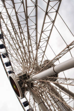 Ferris Wheel on a cloudy skyの写真素材