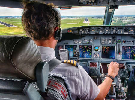 Captain pulling an aircraft throttle