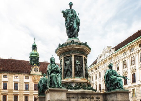 Vienna, Austria - July 09: Hofburg, the former imperial winter palace in the centre of Vienna. Bronze statue of Francis I dressed as a Roman emperor, by Pompeo Marchesi, with Amalienburg, Vienna (Wien), Austria (Osterreich)のeditorial素材