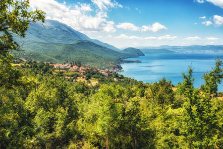 Typical Macedonian fishing village on the shore of lake Ohrid as seen from Galicica National Park, Macedoniaの写真素材