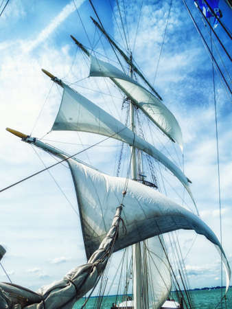 sails, mast and ropes view from below of a classic sailing ship.の写真素材