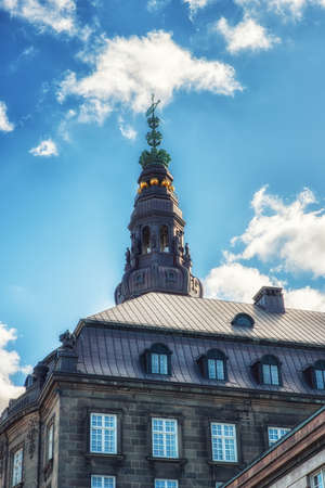 Tower of St Nicholas church over blue sky, Copenhagen, Denmark.の写真素材