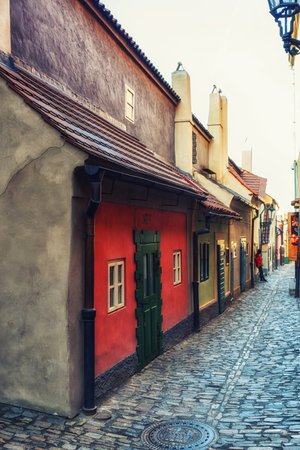 Prague, Czech Republic - April 04:
 Little houses on Golden street inside of Hrandcany Castle, Prague, Czech Republic.のeditorial素材