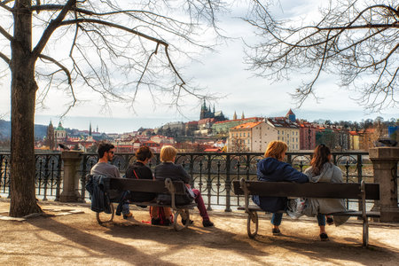 Prague, Czech Republic - April 04:People enjoying the beautiful cityscape of prague, from the banks of the River Vltava.のeditorial素材