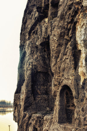 Luoyang, Hernan, China-December 25,2017 : Longmen Grottoes in Luoyang, Chinaのeditorial素材