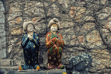 Luoyang, Hernan, China-December 25,2017 : Chinese dolls at Longmen Caves, Luoyang, Chinaのeditorial素材