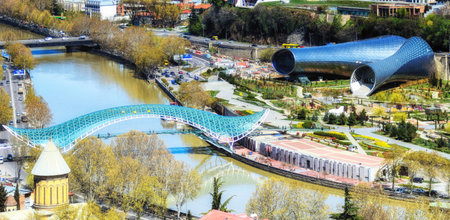Tbilisi, Georgia  - April 12, 2017 :    Bridge of Peace and  Concert Music Theatre Exhibition Hall...