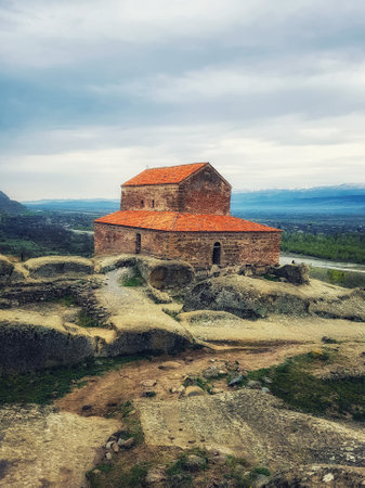 Uplistsikhe, Georgia  - April 13, 2017 :   The Uplistsikhe 9th/10th century three-nave basilica and...
