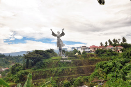 Manado, North Sulawesi, Indonesia - October 02, 2017: Jesus Christ Statue in Manado City, North Sulawesi, is the biggest Jesus Statue in Indonesia that become a famous tourist destination in Manado.のeditorial素材