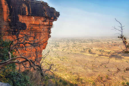 Late dry-seaon rural landscape rocky escarpment central Togo West Africaの写真素材