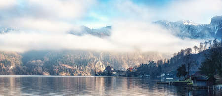 View of Traunkirchen village and Traunstein Mountain with Lake Traunseeの写真素材
