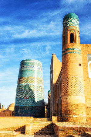 Khiva, Uzbekistan - October 13, 2015: The unique and unfinished Kalta Minor Minaret, covered with bright blue tiles, became the symbol of Khiva.のeditorial素材