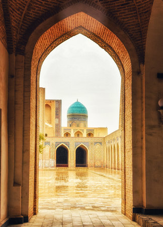 View of The Mir-i Arab Madrasa in Bukhara from the entrance of the Poy Kalon mosque in Bukhara, Uzbekistanのeditorial素材