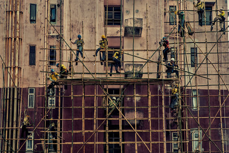 Hong Kong, China - June 26, 2019 : Workers are maintaining old building in Hong Kong.のeditorial素材