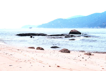 Non Urban scene with locals fishing traditionally at Cheung Chau Island, Hong Kong, Chinaの写真素材