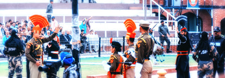Wagah, India - March 13, 2019: The marching Pakistani and Indian guards in national uniform at the ceremony of lowering the flags on the border between Pakistan and India, Wagah, Lahore, Pakistanのeditorial素材