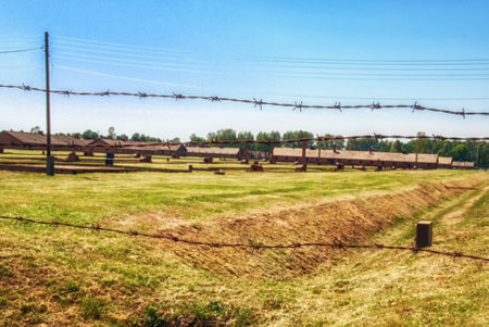 Barbed wire fence at the Auschwitz concentration camp, the biggest extermination camp in Europe...