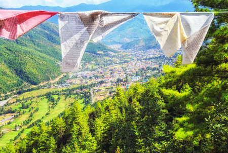 Prayer flags view of Thimphu and valley from the Sangaygang areaの写真素材