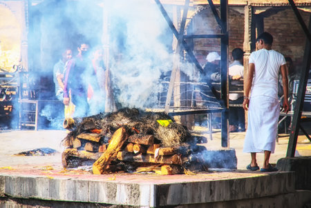 Kathmandu, Nepal - 11 October 2012: Hindu cremation rituals at the banks of Bagmati river at Pashupatinath Temple in Kathmanduのeditorial素材