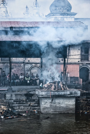 Kathmandu, Nepal - 11 October 2012: Hindu cremation rituals at the banks of Bagmati river at Pashupatinath Temple in Kathmanduのeditorial素材