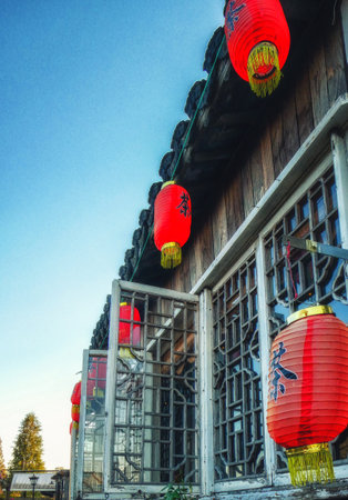Zhujiajiao, China - November 15 2019: Zhujiajiao an ancient town located in the Qingpu District of Shanghai. Old houses dotted with Chinese lanterns surrounding the streets along the canals.のeditorial素材