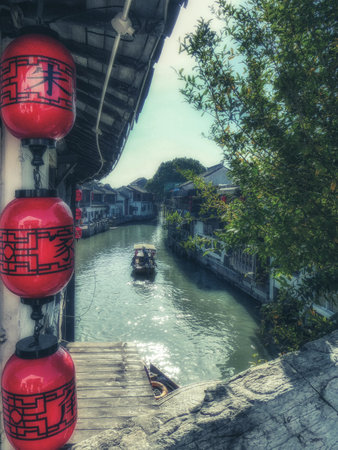 Zhujiajiao, China - November 15 2019: Zhujiajiao an ancient town located in the Qingpu District of Shanghai. Old houses dotted with Chinese lanterns surrounding the streets along the canals.のeditorial素材