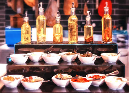 Various tapas wit different kind of oilの写真素材