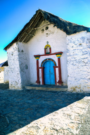 Exterior of the beautiful Parinacota village church located circa Putre, Chile. Parinacota church was built in the 17th century of stone and clay, located 4,400 meters AMSL in Lauca National Park, Chile.の写真素材