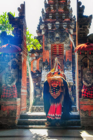 Bali, Indonesia - October 3, 2008:  Balinese Barong ritual dance during open air ceremony at Pura Saraswati temple in Ubud, Bali, Indonesia.のeditorial素材
